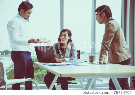 Asian female secretary argue Managing Director and Manager in meeting room Asian female secretary argue Managing Director and Manager in meeting room 76754704