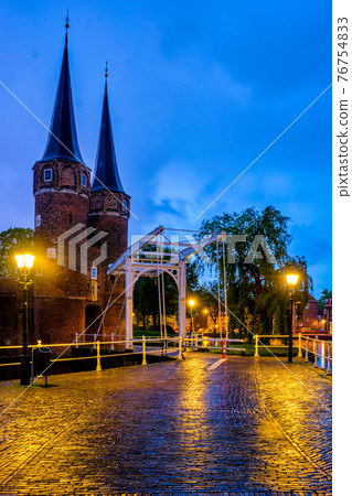 Oostport Eastern Gate of Delft at night. Delft, Netherlands 76754833