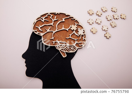 Head of man with brain and wooden puzzle. Alzheimer's disease, dementia and mental health concept Head of man with brain and wooden puzzle. Alzheimer's disease, dementia and mental health concept 76755798