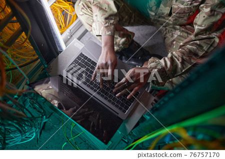 Woman Managing Server Network Top View Woman Managing Server Network Top View 76757170