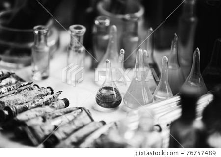 Many Old Deutsch Vintage Medical Glass Capacity. Detail Of Retro Chemical Pharmaceutical Science Researches. Small Bottles Different Sizes From Times Of World War II. WW2 WWII. Black And White Many Old Deutsch Vintage Medical Glass Capacity. Detail Of Retro Chemical Pharmaceutical Science Researches. Small Bottles Different Sizes From Times Of World War II. WW2 WWII. Black And White 76757489