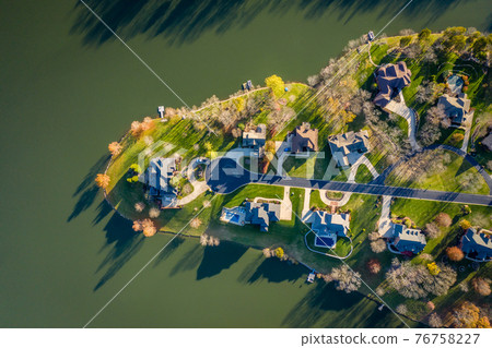 Homes by a lake 76758227