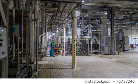 Looking on the giant industrial constructions on a food factory 76758246