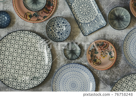 Beautiful traditional Moorish porcelain ceramic plates. illustrated middle eastern design. Marrakech Morocco 76758248