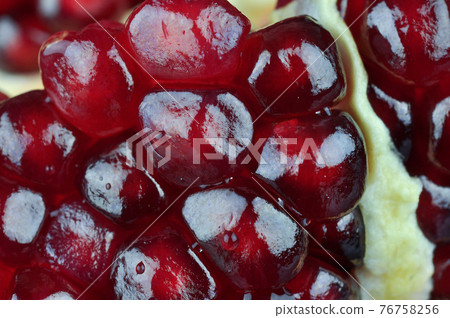 Pomegranates seeds close up. Pomegranates seeds close up. 76758256