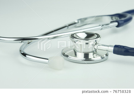 Stethoscope on a white background. Stethoscope on a white background. 76758328