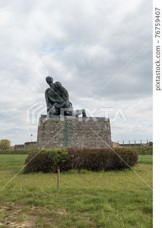 Belgium, Breendonk, statue in memory of the prisoners in front of the camp Belgium, Breendonk, statue in memory of the prisoners in front of the camp 76759407