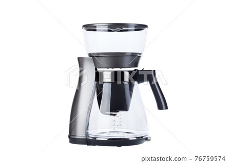drip coffee maker with glass flask for hot freshly brewed beverage home appliances isolated on white background. drip coffee maker with glass flask for hot freshly brewed beverage home appliances isolated on white background. 76759574