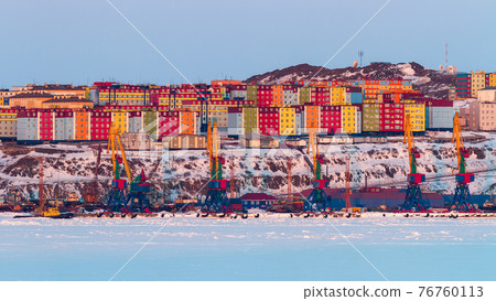 Beautiful winter panorama of the Arctic port town. 76760113