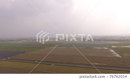 Taking pictures with rice paddies in the agricultural period ~ Drone (Crane flying land / Kashiwara city, Kagoshima prefecture) 76762014