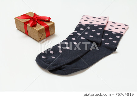 Pair of women socks on a white background. Pair of women socks on a white background. 76764819