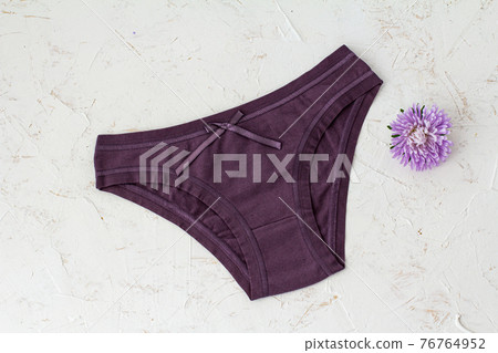 Beautiful women's cotton panties on white background. Beautiful women's cotton panties on white background. 76764952