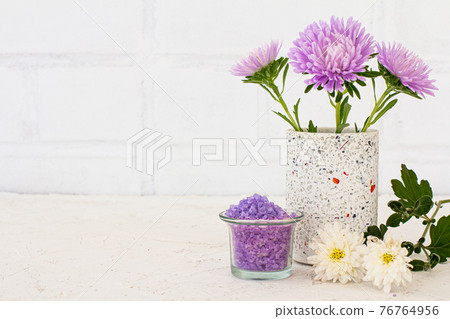 Women wash accessories and cosmetics on a white background. Women wash accessories and cosmetics on a white background. 76764956