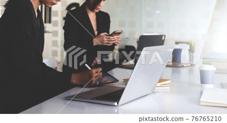 Group of Businessman and Accountant checking data document on digital tablet for investigation of corruption account . Anti Bribery concept Group of Businessman and Accountant checking data document on digital tablet for investigation of corruption account . Anti Bribery concept 76765210