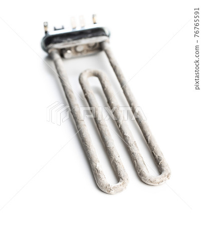 Old washing machine heater with limescale. Old washing machine heater with limescale. 76765591