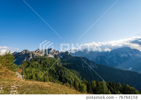 Cima del Cacciatore and the Mountain range of Jof di Montasio - Friuli Italy 76768158