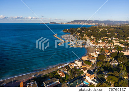 Top view of the embankment and the village of Saint-cyr-sur-mer, France Top view of the embankment and the village of Saint-cyr-sur-mer, France 76769187
