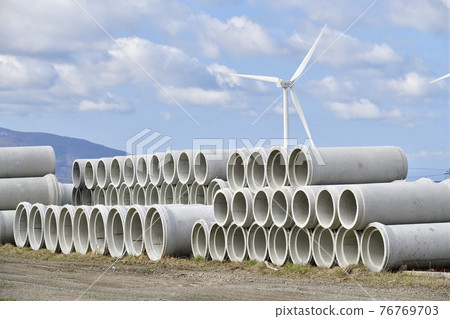 Photographed the scenery of cement factory clay pipes piled up in Setana Town, Hokkaido in spring 76769703