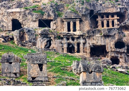 Antique rock burial chambers in ancient Lycian city of Tlos, Turkey Antique rock burial chambers in ancient Lycian city of Tlos, Turkey 76773062