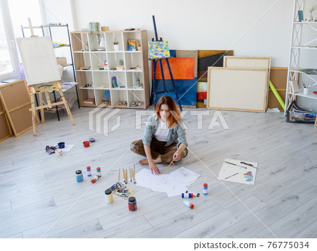 painting art artist woman drawing in light studio painting art artist woman drawing in light studio 76775034