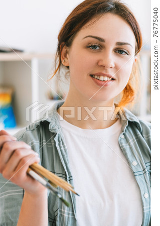 artist portrait painting hobby happy smiling woman artist portrait painting hobby happy smiling woman 76775040