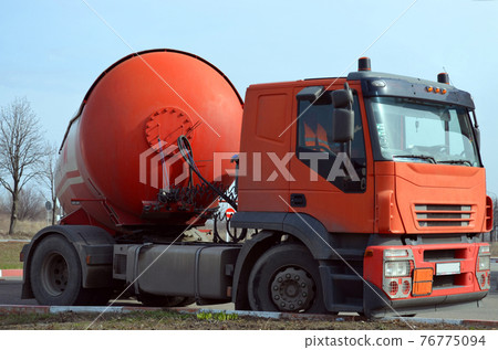 Gasoline tanker red fuel tank. Oil trailer, truck on road 76775094