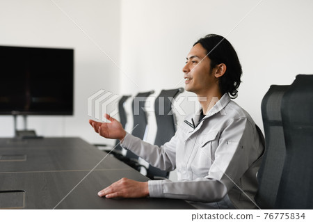Business person working at a company 76775834