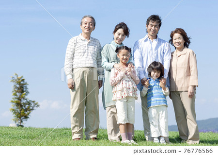 A smiling three-generation family A smiling three-generation family 76776566