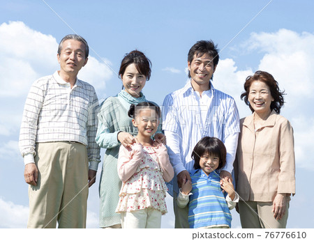A smiling three-generation family A smiling three-generation family 76776610