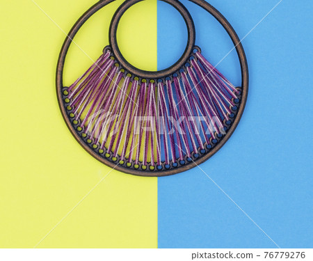 Ethnic decorations on colored sheets of paper. Ethnic decorations on colored sheets of paper. 76779276