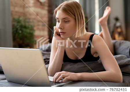 Woman working at home Woman working at home 76782431
