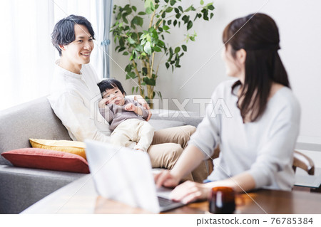 Working mother and Ikumen at home 76785384