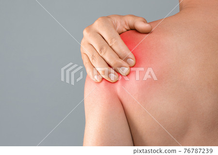 Closeup of topless man suffering from pain in shoulder Closeup of topless man suffering from pain in shoulder 76787239