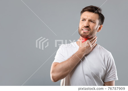 Sick man having sore throat, looking at copy space Sick man having sore throat, looking at copy space 76787909