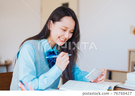 High school students studying online (smartphone) High school students studying online (smartphone) 76788427