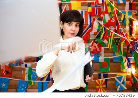 Woman secretary throws papers into the air Woman secretary throws papers into the air 76788439
