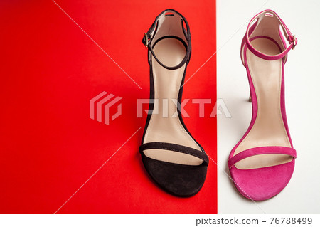Women's sandals in different colors top view. Copy space text. 76788499