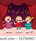 Children sing with a microphone on the stage 76788967