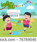 Thai kids splashing water in Songkran festival at the temple. 76789046