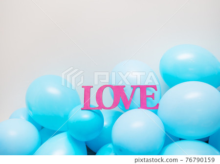 Blue-blue balloons, birthday. Greeting card, wooden pink letters love. 76790159