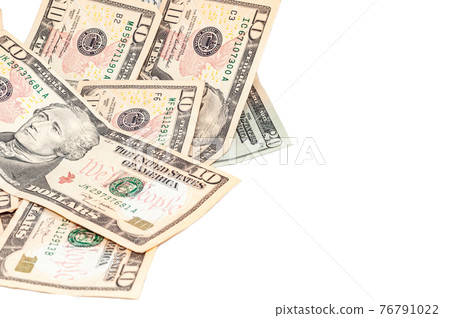 Cash payment, money close-up in denominations 20 and 10 US paper dollars isolated on white background, financial contribution Cash payment, money close-up in denominations 20 and 10 US paper dollars isolated on white background, financial contribution 76791022