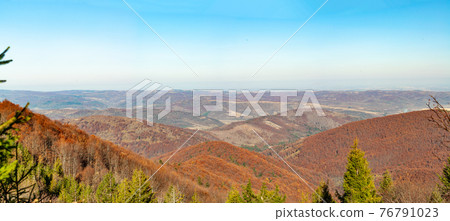 Panorama hills mountain range covered with forest. Nature Carpathians, Ukraine mountain wilderness landscape Panorama hills mountain range covered with forest. Nature Carpathians, Ukraine mountain wilderness landscape 76791023