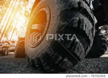 Car tires concept on off road. Shock absorber. Travel and racing concept for 4x4 drive off road vehicle Car tires concept on off road. Shock absorber. Travel and racing concept for 4x4 drive off road vehicle 76792008