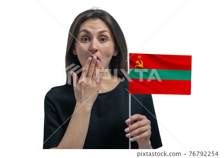 Happy young white woman holding flag of Transnistria and covers her mouth with her hand isolated on a white background Happy young white woman holding flag of Transnistria and covers her mouth with her hand isolated on a white background 76792254