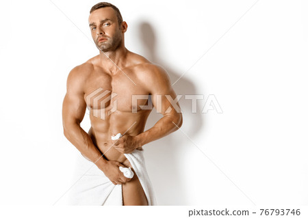 Sexy sport muscle fit strongface guy with white towel on whiteisolated  font background  76793746