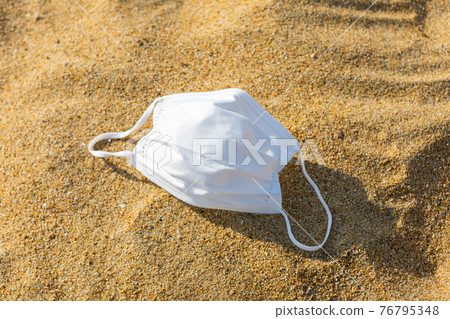 Mask and sandy beach Mask and sandy beach 76795348