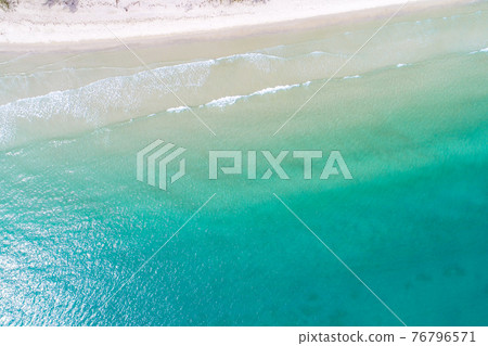 Top view aerial image of an stunning beautiful sea landscape white sand beach with turquoise water copy space, Top view aerial image of an stunning beautiful sea landscape white sand beach with turquoise water copy space, 76796571
