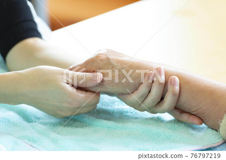 Hand massage Hand massage 76797219