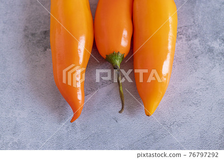 Peruvian yellow pepper. Yellow pepper used in Peruvian cuisine. Peruvian yellow pepper. Yellow pepper used in Peruvian cuisine. 76797292