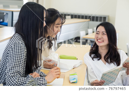 College students chatting in the lecture room College students chatting in the lecture room 76797465